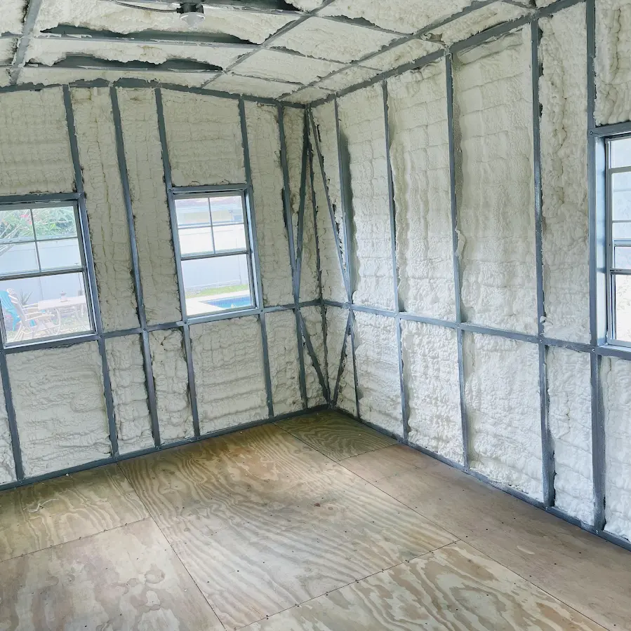 Closed-cell spray foam insulation applied to wall cavities in a residential project in St. Thomas